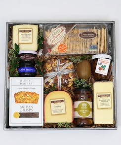 Locally-sourced pretzels and cheese in a square gift basket