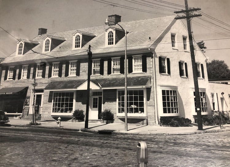 A black-and-white photograph of our building exterior, as seen in the 1970s